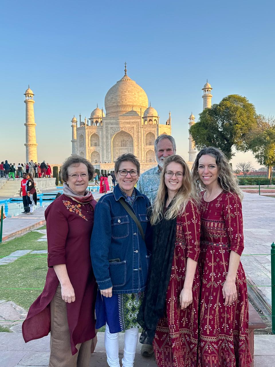 Taj Mahal at sunrise — golden light on white marble, Agra