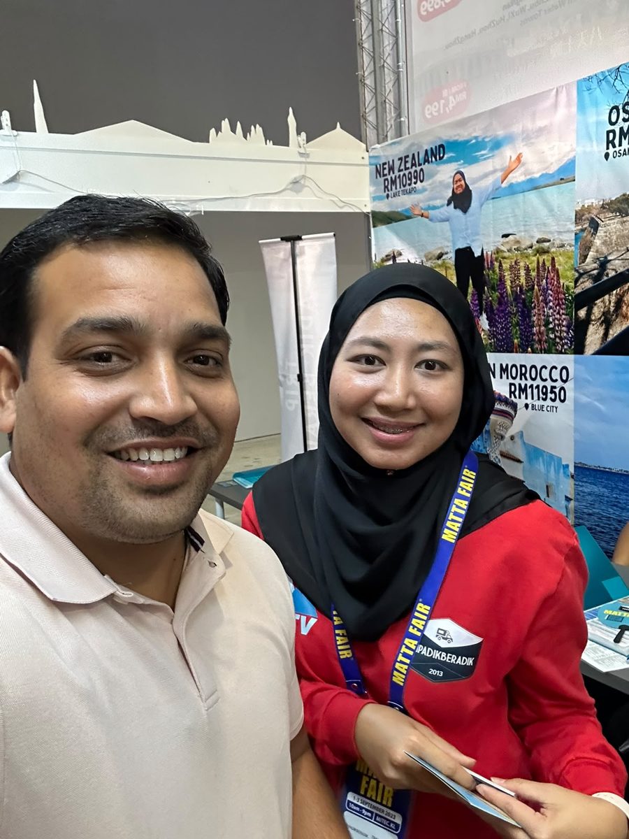 Networking with agents at MATTA Fair, Malaysia