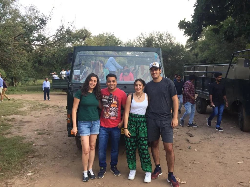 Perfect Agra Tours guests beside their safari jeep at the Ranthambore park gate