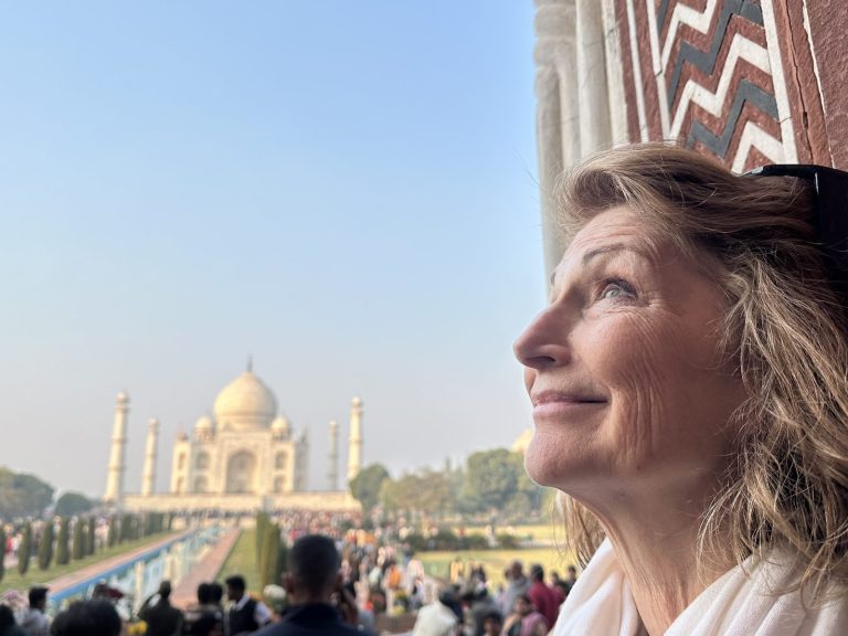 The Taj Mahal under a clear winter sky, seen from the mosque terrace