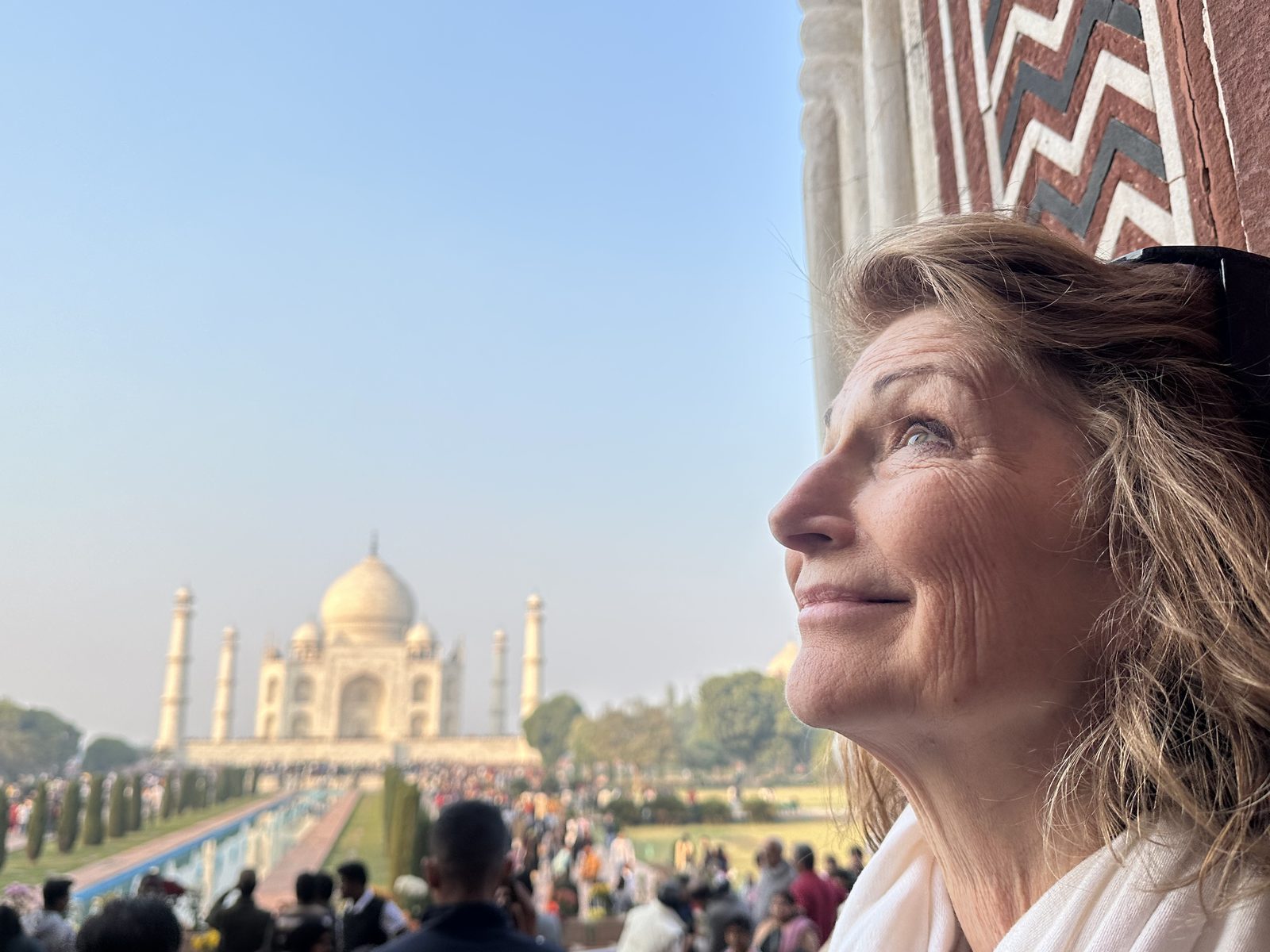 The Taj Mahal under a clear winter sky, seen from the mosque terrace